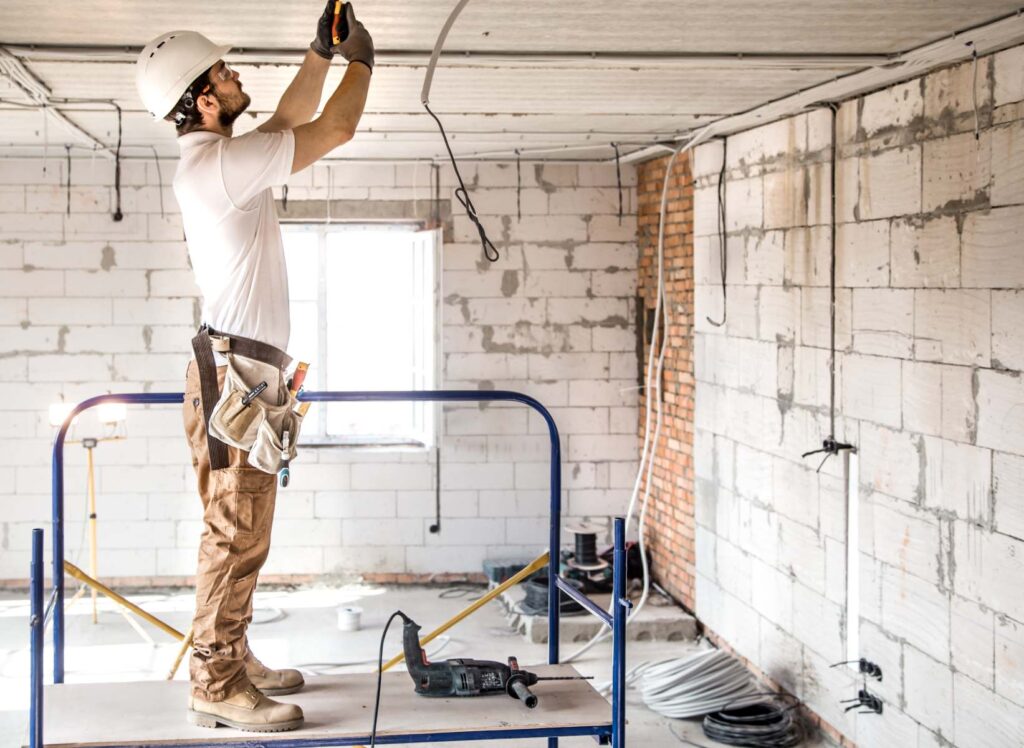 man working for loft conversion